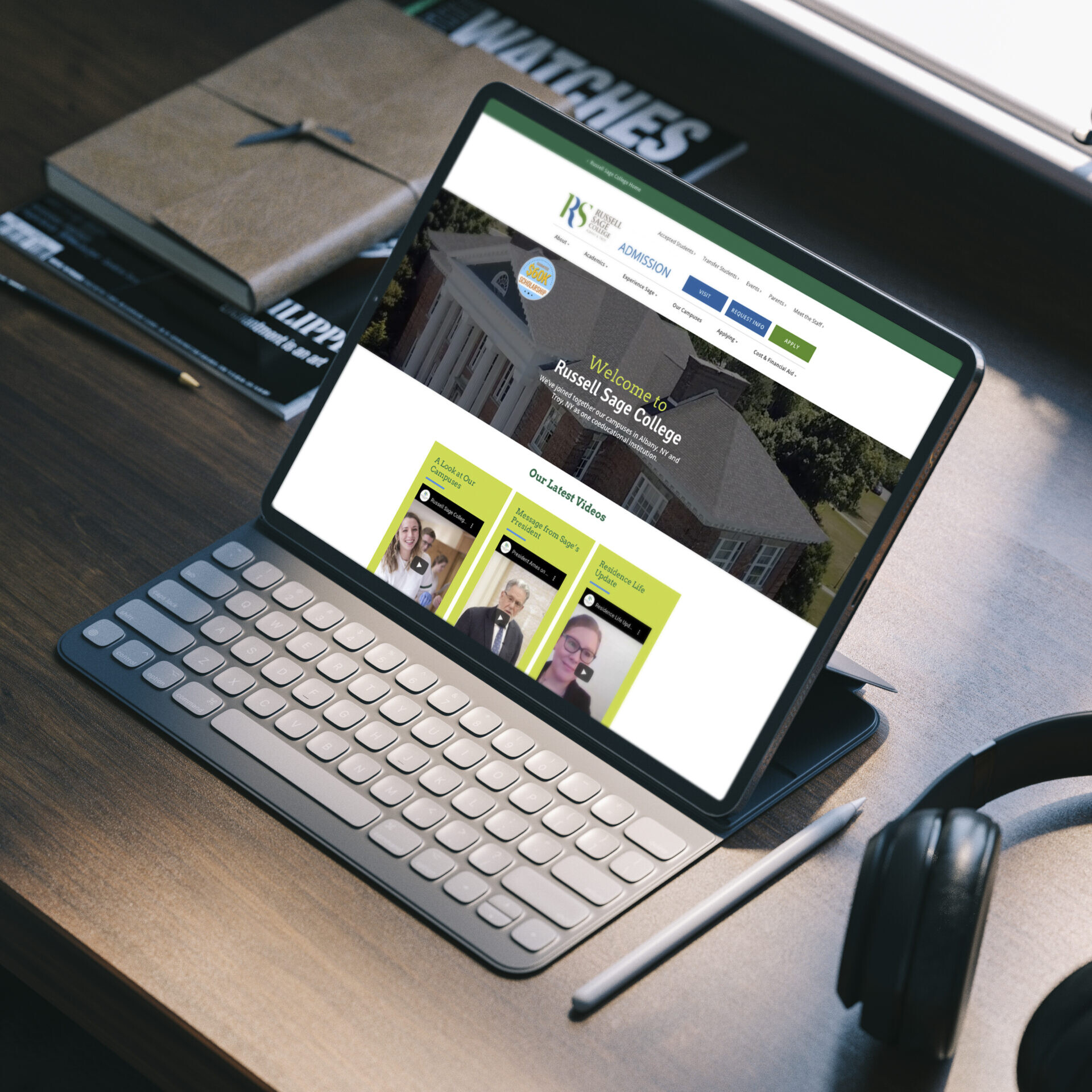 A photo of a tablet with the Russell Sage College website on the screen